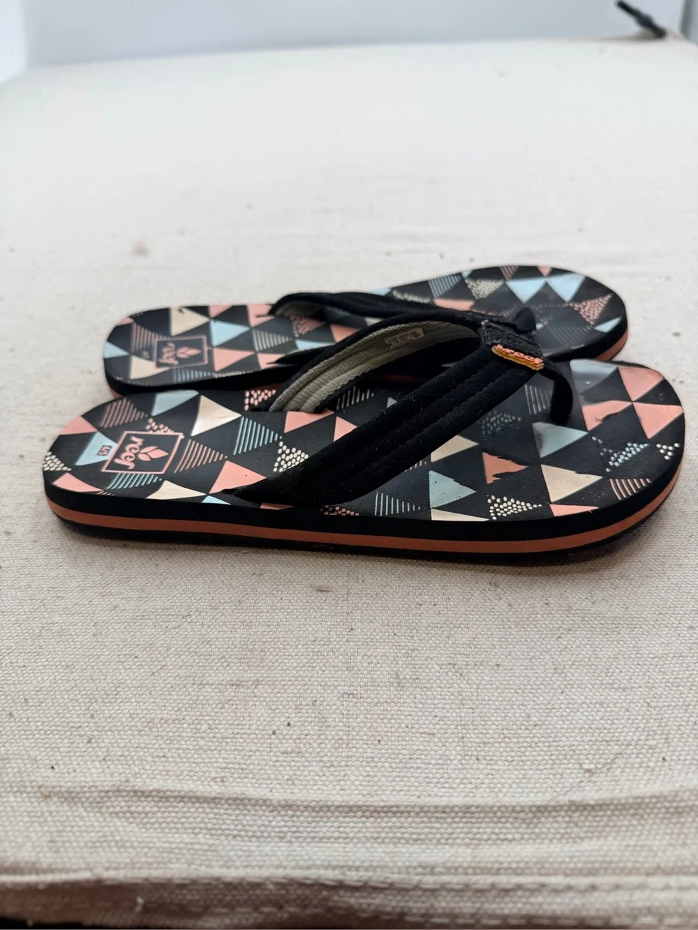 Reef Black Flip Flops with Coral & Light Blue Triangle Print